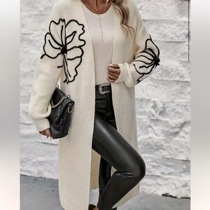 1159.Elegant  Cream Cardigan with Black Floral Design
